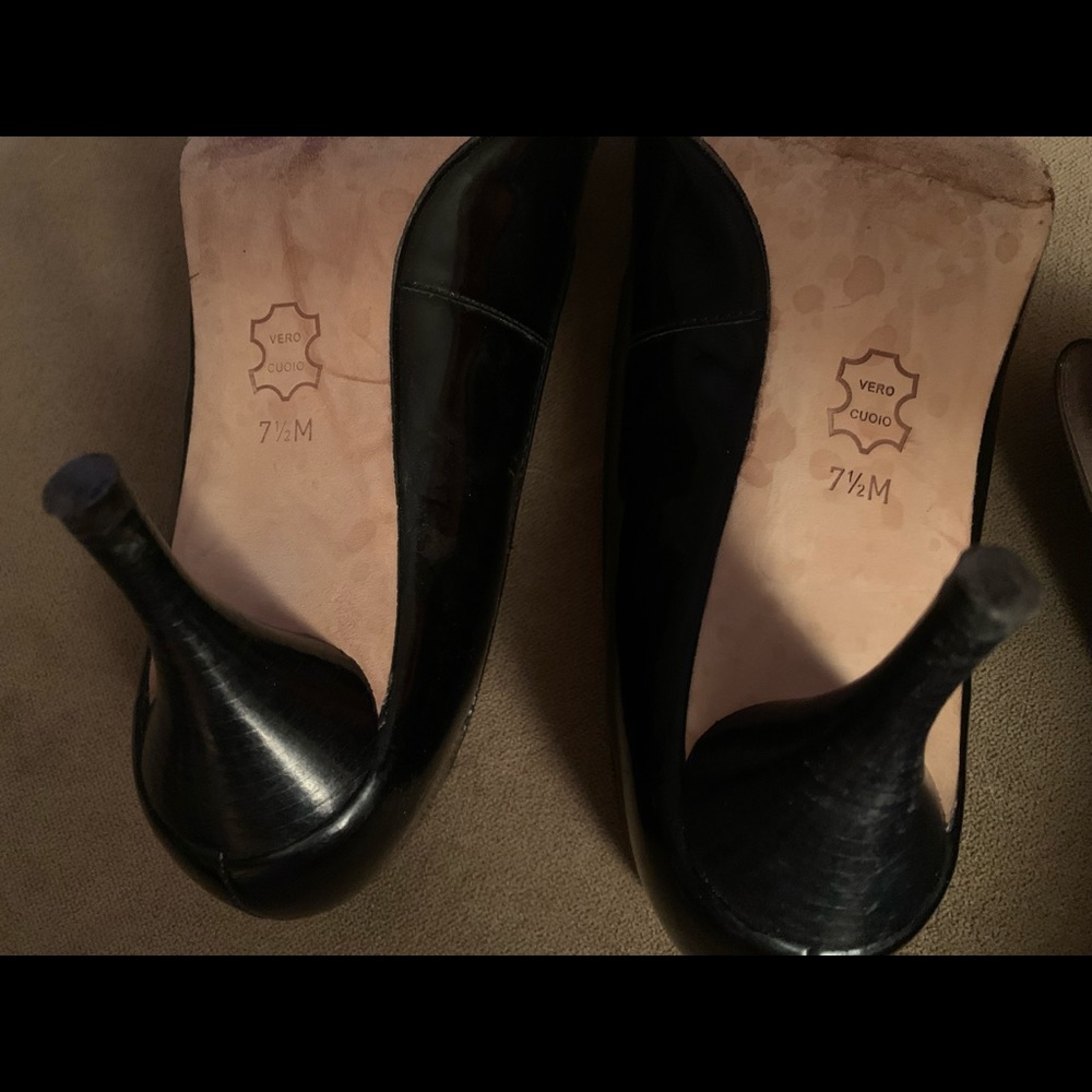 2 pairs of beautiful Michael Kors shoes.